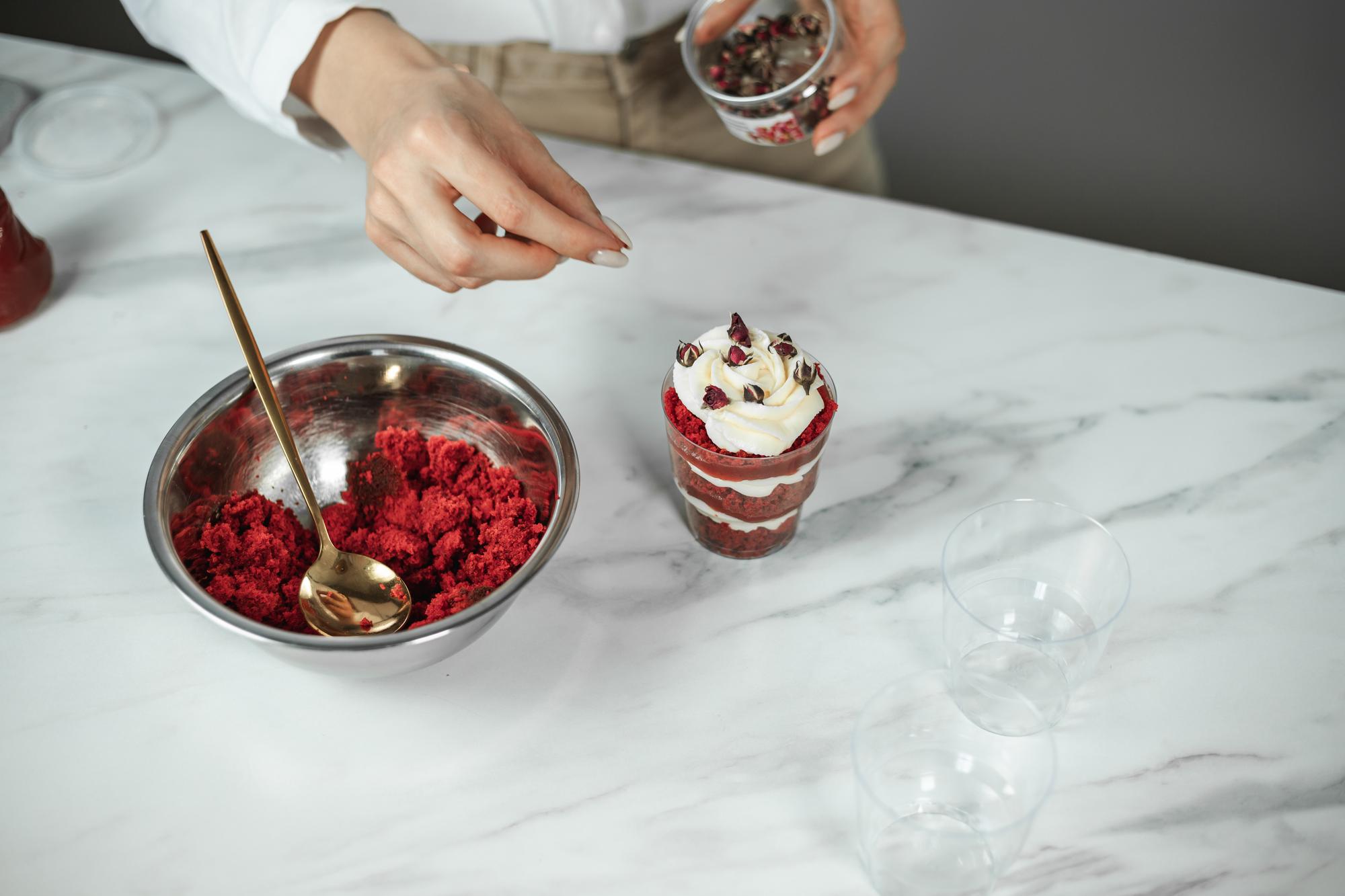 Studio kitchen with marble counter and plated desserts
